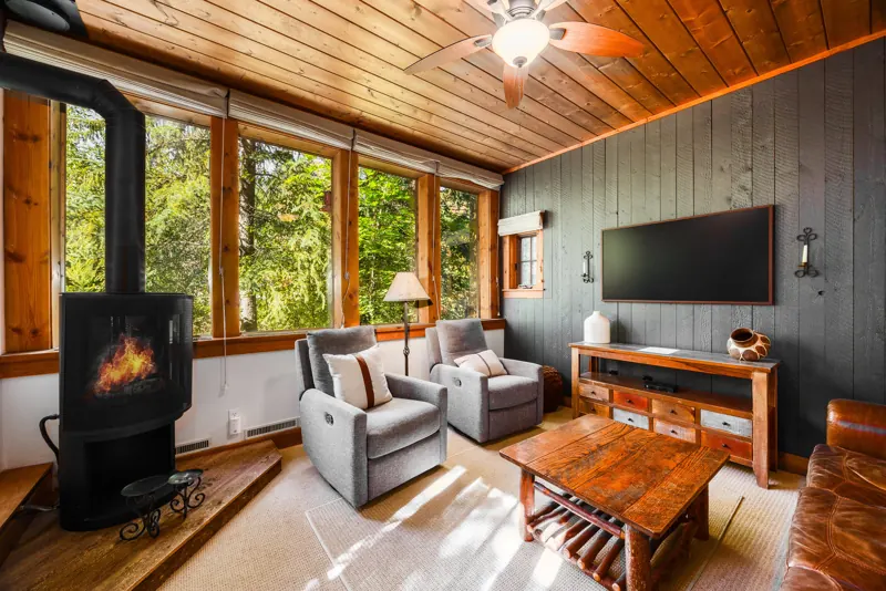 Cedar-ceilinged living room with gas fireplace in Lower Hollow, a 2-bedroom Sundance condo rental