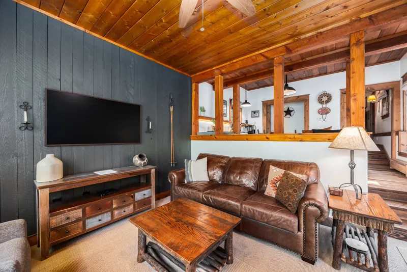 Living room with TV in the Sundance 2-bedroom condo