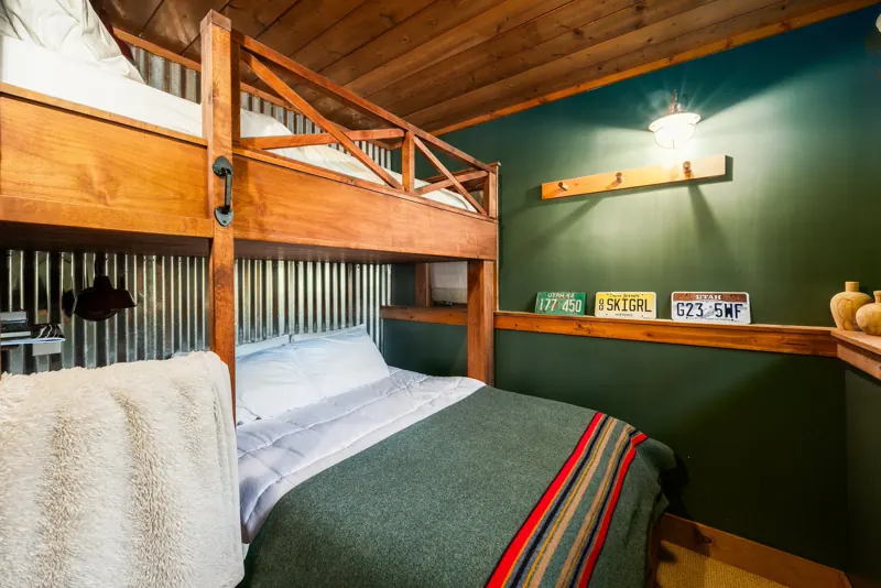 Bedroom 2 with queen bed and twin bunk